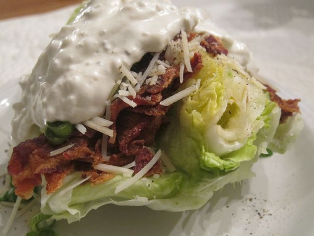 This classic restaurant-style salad is fancy, but so easy to make. With this step-by-step tutorial you can wow your guests with this easy wedge salad. #WomenLivingWell #easyrecipe #salad #bacon