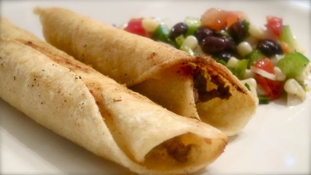 These are the best homemade beef taquitos. Perfect for game day or potlucks, they are spicy and very easy to make. Your family will love these! #WomenLivingWell #taquitos #beef #easyrecipes