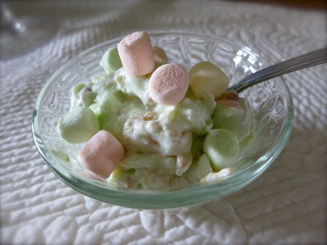 Also known as "Watergate Salad", this creamy salad is is simple, colorful, and delicious. Perfect for a guests and potlucks. #WomenLivingWell #dessert #marshmallow #salad