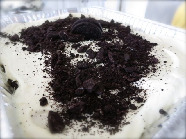 This Edible Dirt Pudding is not only a lot of fun to do with your kids, it is super delicious and works as a fun dish for a dessert social or potluck.  #easyrecipe #dessert #oreo