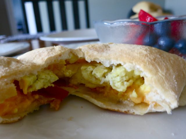 These homemade breakfast hot pockets recipe is super easy and perfect to grab on the go. Plus you can make them ahead of time for the freezer. #womenLivingWell #breakfast #easyrecipes #hotpockets